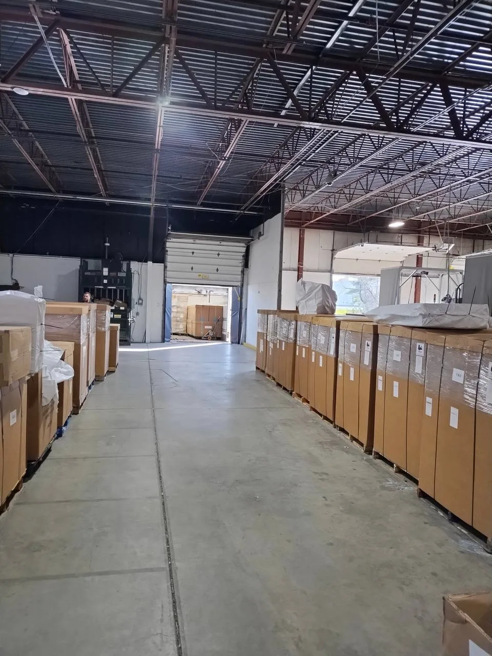 Organized inventory staged inside the Omnaris warehouse